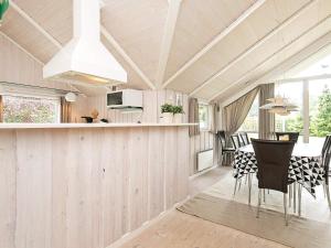 A balcony or terrace at Three-Bedroom Holiday home in Otterup 1