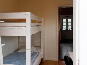 a couple of bunk beds in a room at Holiday home Esbjerg V XVII in Esbjerg