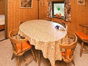 a dining room with a table and chairs at 6 person holiday home in N rre Nebel in Nørre Nebel
