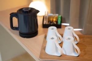 Příslušenství pro přípravu čaje a kávy v ubytování Hotel Sugicho