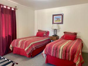 Postel nebo postele na pokoji v ubytování Greybull Motel