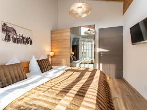 Łóżko lub łóżka w pokoju w obiekcie Green Garden Lodge B3