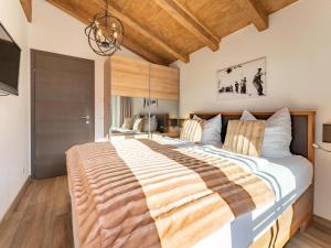 Łóżko lub łóżka w pokoju w obiekcie Green Garden Lodge B3