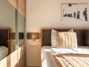 Łóżko lub łóżka w pokoju w obiekcie Green Garden Lodge B3