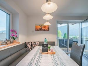 a living room with a couch and a table at Apartment Daisy in Stuhlfelden