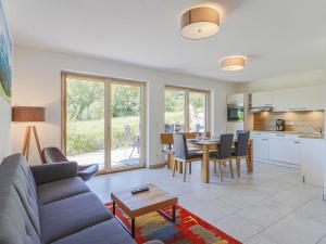 a living room with a couch and a table at Haus Rabl Hansi in Itter