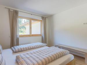 Postel nebo postele na pokoji v ubytování Haus Rabl Hansi