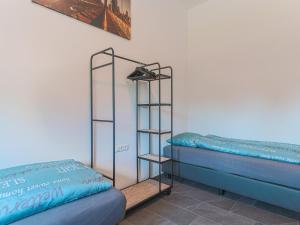 A bed or beds in a room at Residenz Brixental Top 4