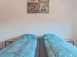 A bed or beds in a room at Residenz Brixental Top 4