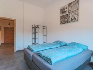 A bed or beds in a room at Residenz Brixental Top 4