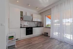 Kuchyňa alebo kuchynka v ubytovaní Apartments with a parking space Orebic, Peljesac - 646