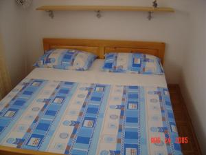 Postel nebo postele na pokoji v ubytování Apartments by the sea Tkon, Pasman - 341