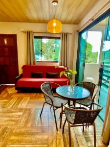 Posezení v ubytování Casa aluguel Abraão ilha grande 4,Ar + 5 fotografií