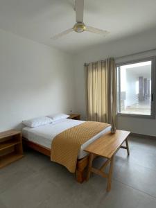 Voodi või voodid majutusasutuse Samana Hostal, Puerto Engabao toas