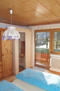 Postel nebo postele na pokoji v ubytování Haus Bergwelt