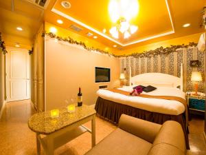 Postel nebo postele na pokoji v ubytování Hotel Gallery (Adult Only)
