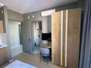 TV a/nebo společenská místnost v ubytování boulevard apartments