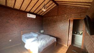 Postel nebo postele na pokoji v ubytování MANTA GUEST HOUSE