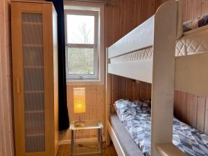 Postel nebo postele na pokoji v ubytování 8 person holiday home in SVEIO