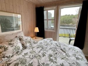 Postel nebo postele na pokoji v ubytování 8 person holiday home in SVEIO