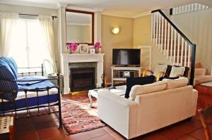 A seating area at Bougainvillea House - The Heart of Simonstown