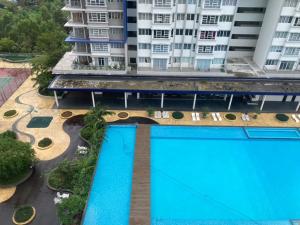 Vista de la piscina de AF Homestay Islamic Concept at Palmera Residence Nearby Bangi, Kajang, Nilai & KLIA o alrededores