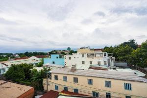 a view of a city with buildings and trees at Khách Sạn Tràng An in Thu Dau Mot +43 photos