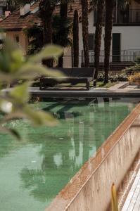 The swimming pool at or close to Boutique Hotel Eschenlohe