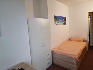 Postel nebo postele na pokoji v ubytování Onkel Tom Amazonien & Ozeanien