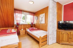 Μια τηλεόραση ή/και κέντρο ψυχαγωγίας στο Fewo Röspe