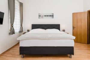 Postel nebo postele na pokoji v ubytování Central-Inn Werfen