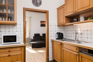 Kuchyň nebo kuchyňský kout v ubytování Central-Inn Werfen