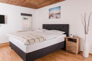 Postel nebo postele na pokoji v ubytování Central-Inn Werfen