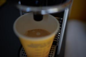 a drink is being poured into a blender at Buddy Hotel in Munich