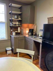 a kitchen with a sink and a counter top at Redefined Alchemy - The Studio in Little Falls