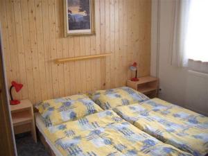 Łóżko lub łóżka w pokoju w obiekcie Apartment Marie