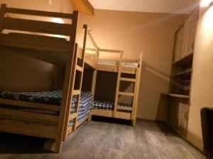 a room with two bunk beds in a room at Two various entire apartments in New Gudauri -Redco, Near Main Gondola in Gudauri