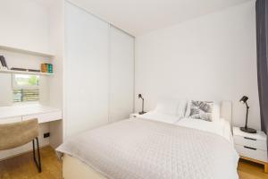 Posteľ alebo postele v izbe v ubytovaní Apartament SAND SurfingBird Dźwirzyno
