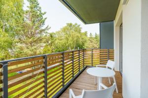 Balkón alebo terasa v ubytovaní Apartament SAND SurfingBird Dźwirzyno