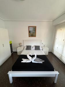 Säng eller sängar i ett rum på Olivereta con balcon