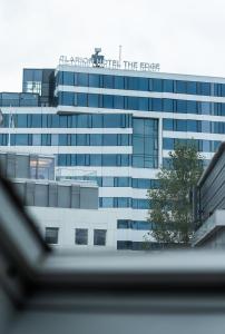 a large building with the words fire on it at City Square in Tromsø