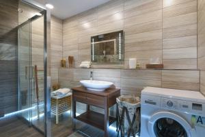 Kúpeľňa v ubytovaní TATRYSTAY Smrek Apartments