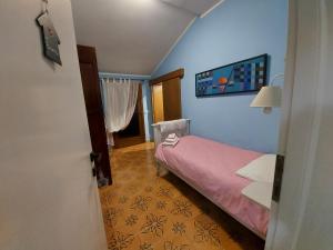 Postel nebo postele na pokoji v ubytování B&B Nonna Assunta