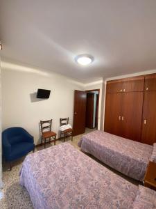 Postel nebo postele na pokoji v ubytování Apartaments Sant Antoni