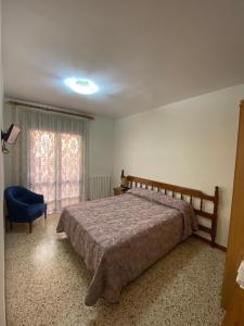 Postel nebo postele na pokoji v ubytování Apartaments Sant Antoni