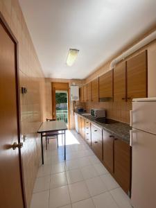 Kuchyň nebo kuchyňský kout v ubytování Apartaments Sant Antoni