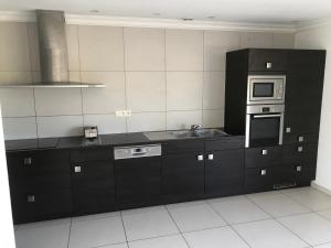 Kuchyňa alebo kuchynka v ubytovaní Villa avec son spa privatif proche de Rocamadour + 14 fotografií