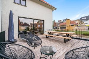 En balkon eller terrasse på Sublieme, ruime luxe villa 10p met terras én tuin