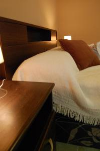 سرير أو أسرّة في غرفة في Siete Cepas