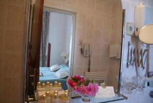 Een badkamer bij Hotel Mozart